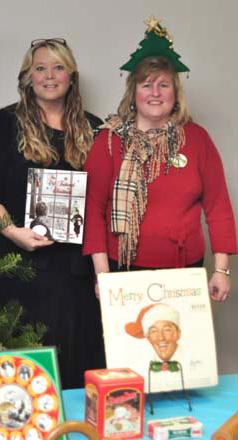 Two Ladies Holding Books